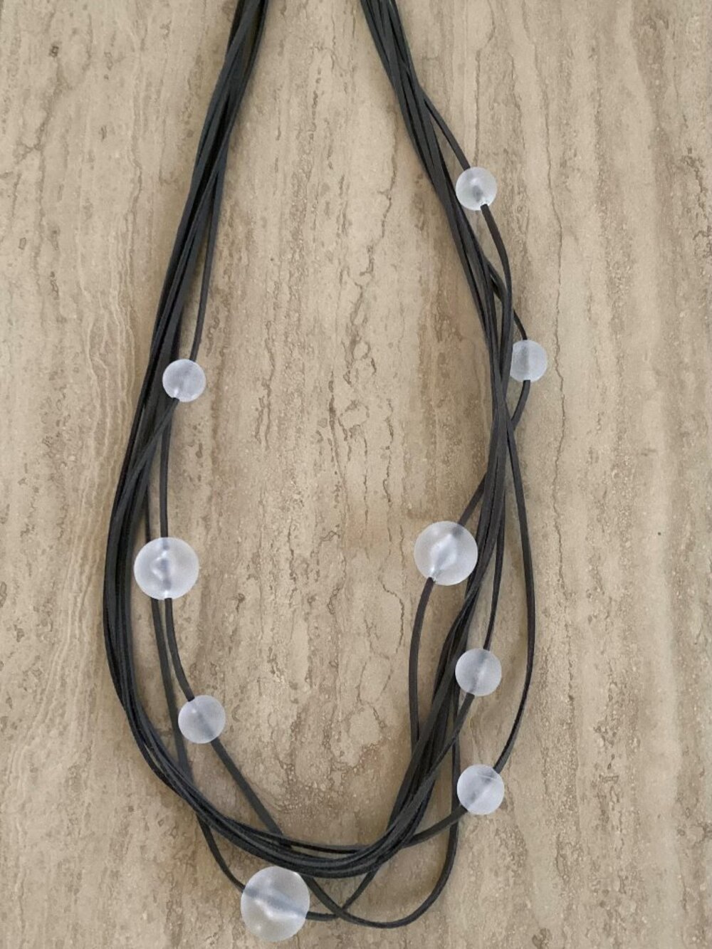 37" necklace - clear lucite beads on gray suede cord, with lobster clasp